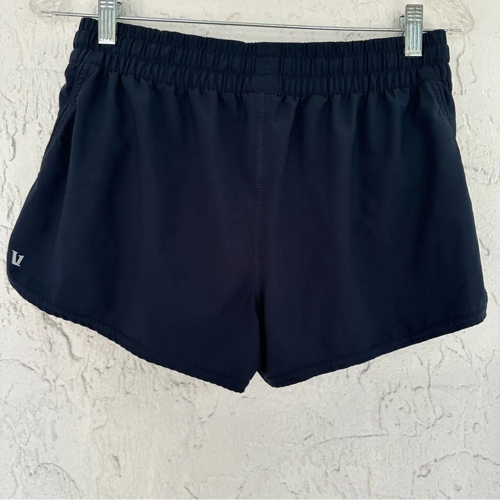 VUORI Womens Size Medium Clementine Navy Blue Shorts Pockets Drawstring Waist